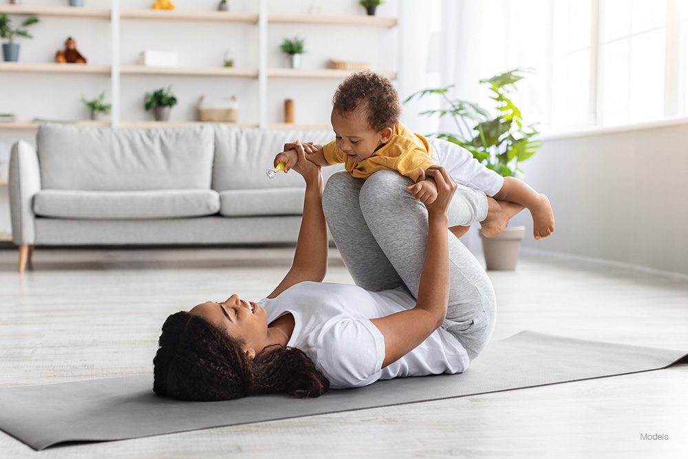 Woman playing with a child